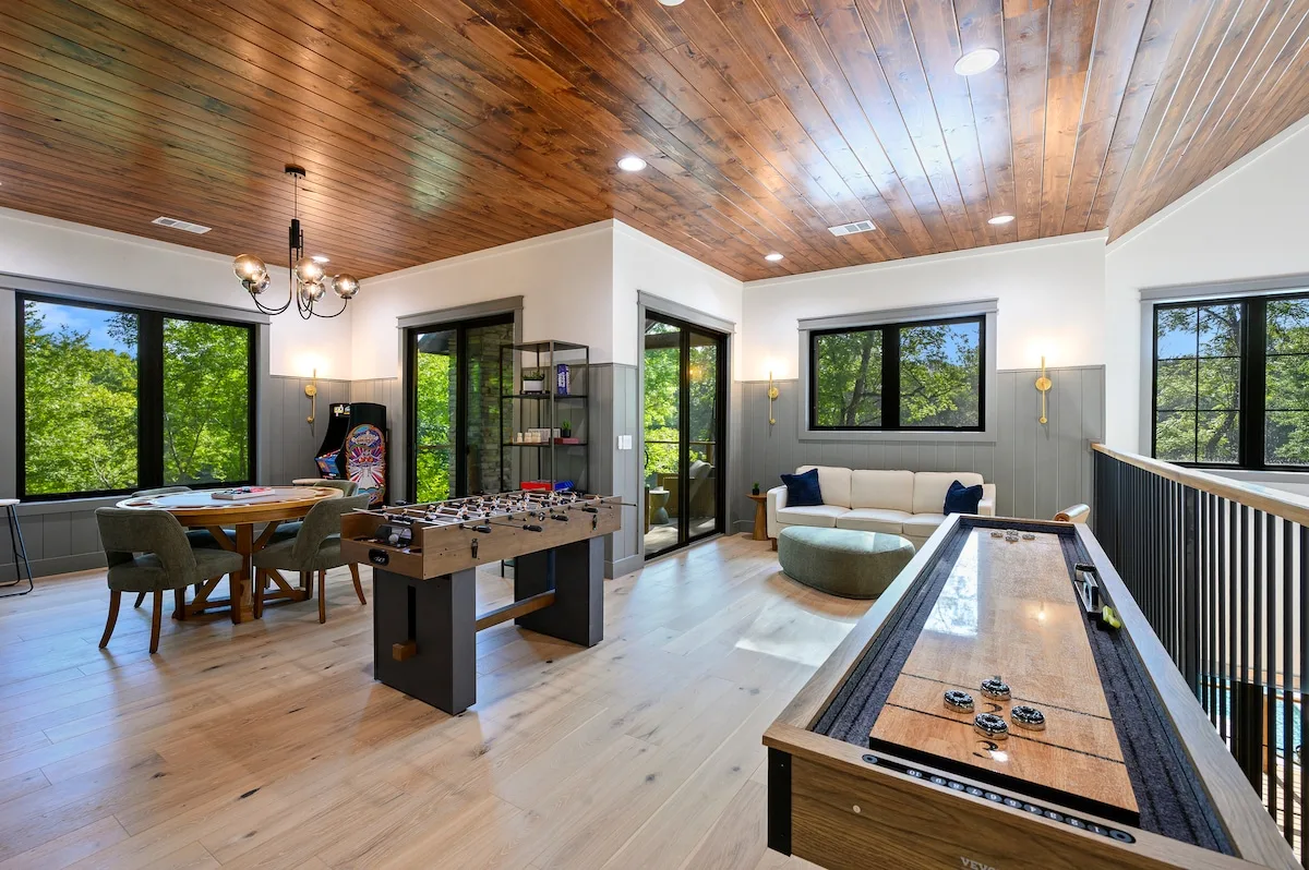 Clearwater game loft with shuffleboard, foosball, and arcade games