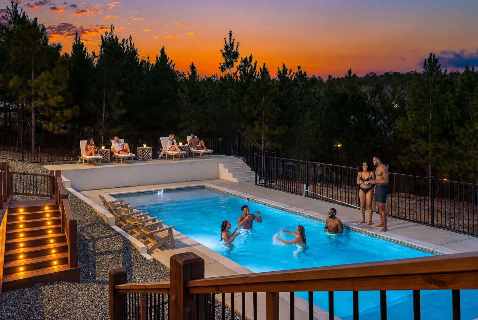 Malibu luxury cabin exterior in Broken Bow with outdoor deck and hot tub surrounded by pine forest
