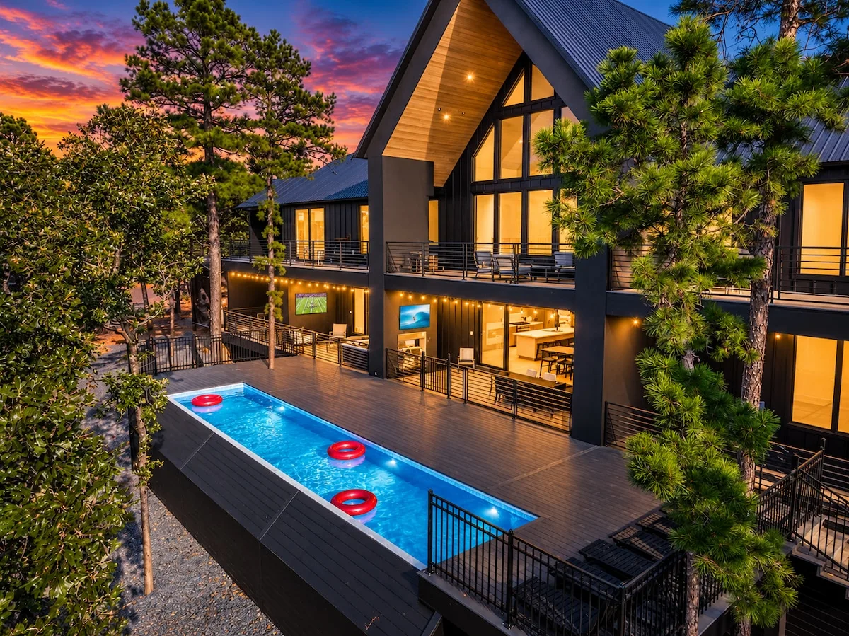 Sanctuary at the Summit infinity pool overlooking the Broken Bow pines at sunset